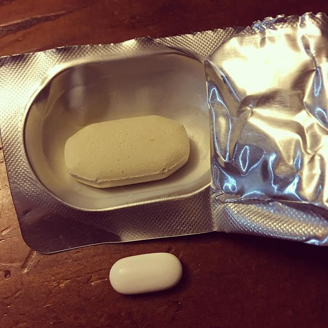 The most enormous antibiotic I have ever taken. That's a nurofen underneath #onlyinthailand