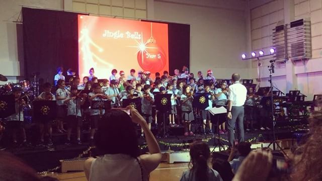 This is half of the year five students with their music teacher. Most of these children only started playing their instruments 12 weeks ago.  Enjoy the squeaks ️